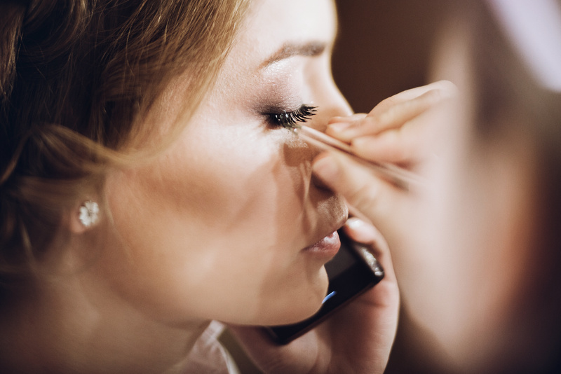 Make up. Bride Getting on Her Make-up on by Professional Artist,